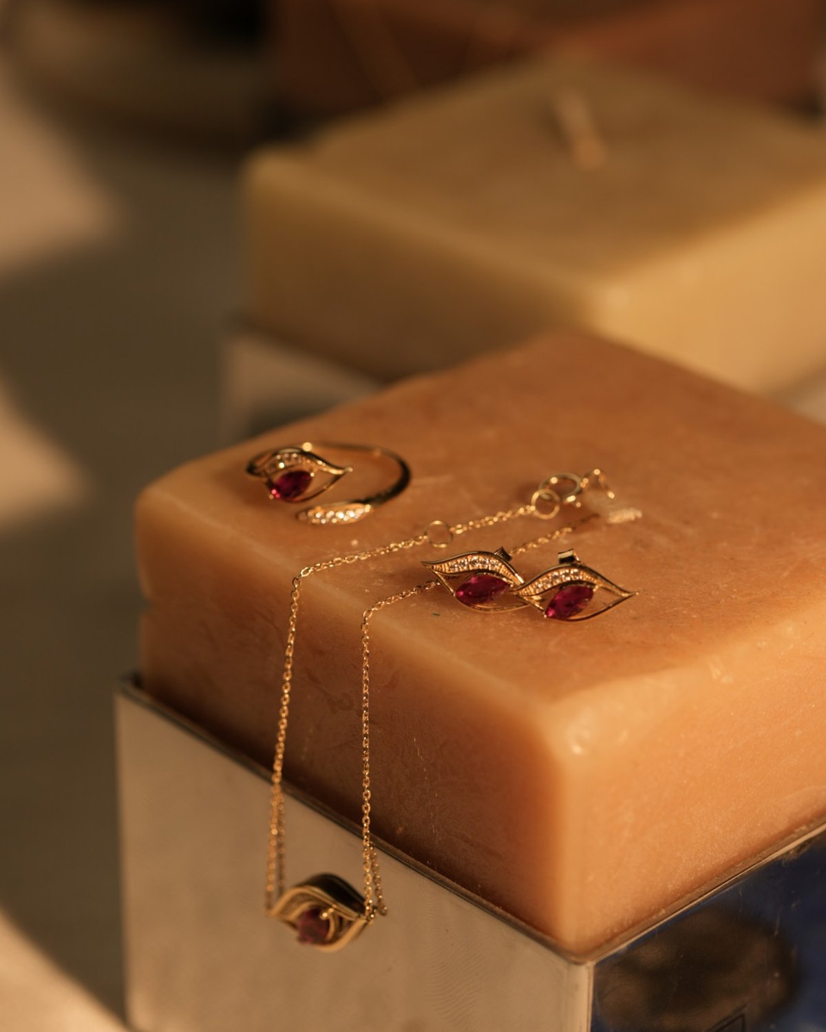 Gold horse eye bracelet laid out with other Siaram pieces